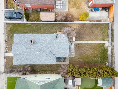 Large 4700 sqft (47' x 100') lot with older rental house in a very desirable area close to Okanagan...