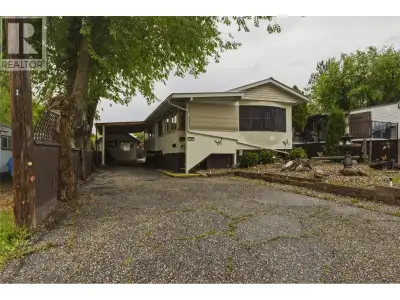 Affordable Country Living with Swan Lake Views! Welcome to Scenic Place, where this well-maintained...