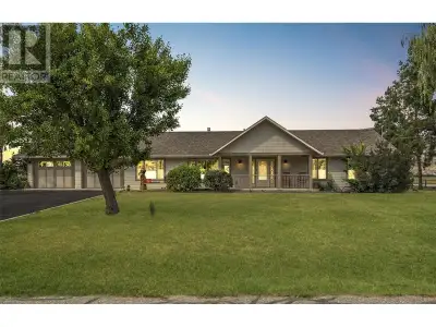Nestled in the heart of Coldstream, 7800 Howe Drive offers an idyllic retreat that offers both count...