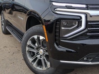 This Chevrolet Suburban boasts a Gas V8 5.3L/ engine powering this Automatic transmission. ENGINE, 5... (image 9)