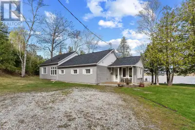 Rare Year-Round Waterfront Bungalow On Olmstead Lake. Escape to paradise with this stunning 3-bedroo...