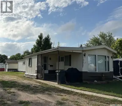 Solid mobile home situated on a large lot with a lovely bank of mature trees offering great privacy....