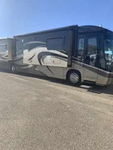 Welcome to Skyline RV Travel Centre! Step into luxury and performance with the 2011 Entegra Coach As...