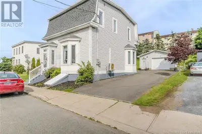This beautifully updated character home perfectly blends modern convenience with timeless charm. Ext...
