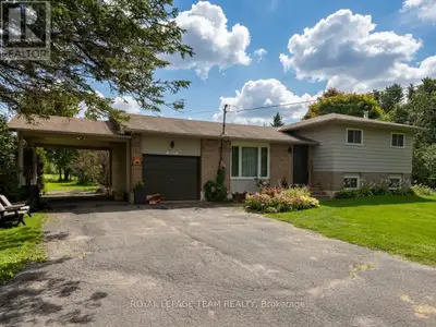 Nestled on 4.8 expansive acres in Kemptville, this meticulously maintained 3-bedroom, 2-bathroom sid...