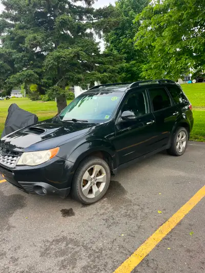 2013 Subaru Forrester. Engine needs work. No trades. Serious inquiries only. Make me an offer.