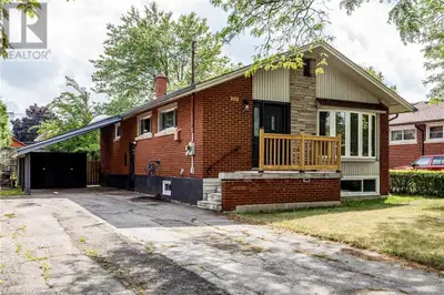 Welcome to 20 Burfield Avenue! This turnkey bungalow is more than meets the eye and features 5 beds,...