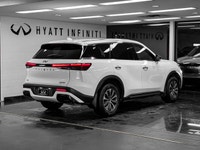 Elevate your driving experience in the sophisticated 2025 INFINITI QX60 Pure, finished in striking G... (image 3)
