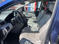 HERE IS A NICE CLEAN FAMILY HONDA VAN THAT IS RELIABLE AND LOADED THIS VAN LOOKS AND DRIVES GREAT AN... (image 9)