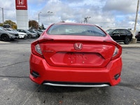 The 2021 Honda Civic Sedan LX in vibrant Rallye Red is your reliable and stylish companion for daily... (image 5)