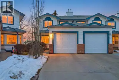 End-Unit Townhome in Quiet Citadel | Across from Park | Attached Garage. This well-maintained end-un...