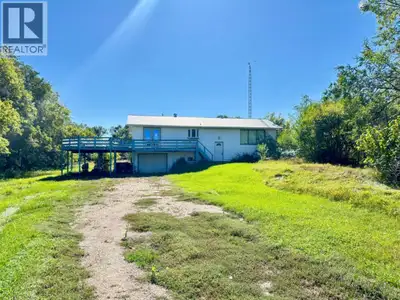 Located in the RM of Eldon, this bi-level home sits on 3.53 acres and offers five bedrooms and three...