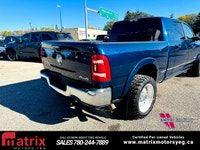 The 2020 Ram 3500 Limited 4x4 Mega Cab with a 6'4in. box is a premium, heavy-duty truck featuring a... (image 6)