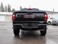 Meet the 2026 GMC Canyon Elevation Crew Cab Short Box 4-Wheel Drive Elevation, a black powerhouse re... (image 3)