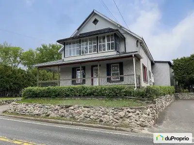 Investissez à Mont-Tremblant : Duplex centenaire avec revenu, garage et grand terrain Opportunité un...