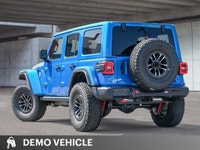 Conquer any terrain in this stunning 2026 Jeep Wrangler Rubicon X in Hydro Blue Pearl, showcasing ro... (image 4)