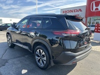 Slide into this sleek 2022 Nissan Rogue SV, boasting a Super Black exterior and a surprisingly spaci... (image 7)