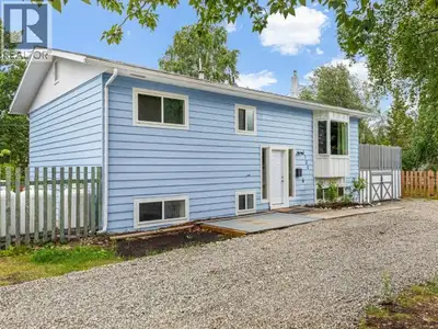 Attractive & spacious 3-bedroom family home on quiet street in Porter Creek. This bi-level layout w/...