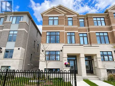 Experience elevated living in this beautifully upgraded end-unit townhome, showcasing over $100,000...