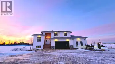 This stunning acreage offers the perfect balance of city convenience and rural serenity. Situated on...