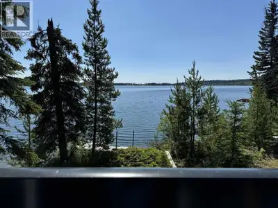 Here's your chance to have a WATERFRONT property. This cute and rustic cabin is on just over four ac...