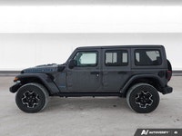This *2021 Jeep Wrangler 4xe Unlimited Rubicon* combines legendary off-road capability with modern p... (image 2)