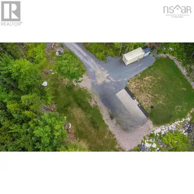 Welcome to 111 Middle Lake North Rd, Lot 276, a fully landscaped, slice of paradise in Chalet Hamlet...