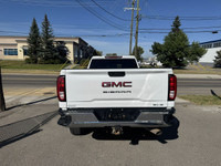 This vehicle is equipped with: 6.6L 8 Cylinder Gas Engine 4Wheel Drive Long Box Heated Steering Whee... (image 3)