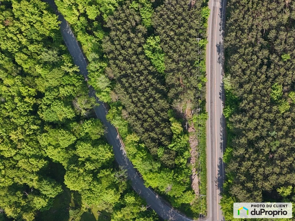 $215,000 - Price taxes included - Residential Lot in Sutton — photo 2