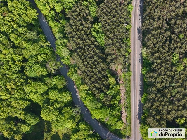 $215,000 - Price taxes included - Residential Lot in Sutton — photo 2
