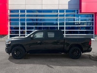 This Ram 1500 has a trusty Twin Turbo Premium Unleaded I-6 3.0 L/183 engine powering this Automatic... (image 1)