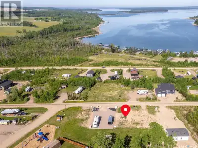 This lakeview lot on Lac Des Iles Lake in Lauman's Landing Subdivision is ready for your RV or park...