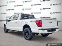 The 2026 Ford F-150 XLT, dressed in a striking Oxford White finish, showcases a commanding 4x4 drive... (image 4)