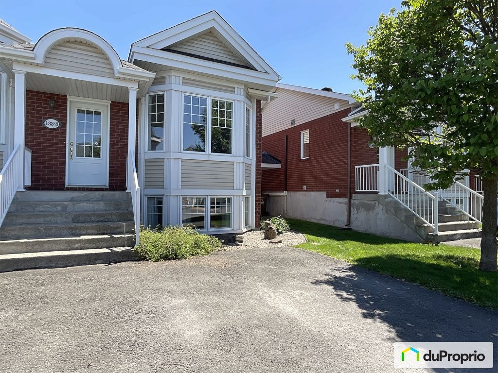 $479,900 - Townhouse for sale in St-Basile-Le-Grand — photo 1