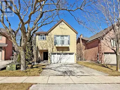 This Immaculate 3+1 Bdrs Backsplit 5, Double Garage Detached House Has A Great Pie Shape Lot ( More...