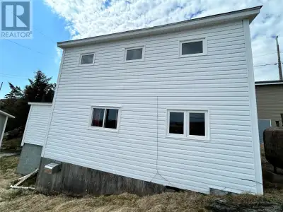 Introducing 14 School Road , a cozy three bedroom traditional salt box home overlooking Rose Blanche...