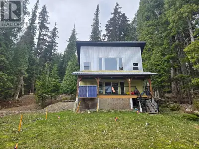 Looking for a private place to relax right on the water at Lakelse Lake? This is a perfect cabin for...