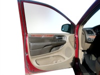 A spacious family minivan with comfortable seating, convenient features, and versatile cargo space,... (image 6)