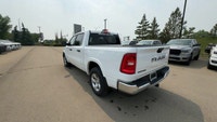 This 2025 RAM 1500 BIGHORN/LONESTAR CREW 4X4 has the following options Cloth Bench Seat, Remote Star... (image 6)