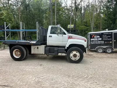 Yard Sale Item C8500 GMC With Cat Motor, Manual transmission, air brakes, Truck runs like a top. Rea...