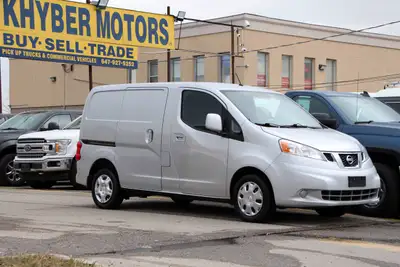 2013 Nissan NV200 SV with 259,589 kilometers. Silver on Black interior with the 2.0L 4-Cylinder engi...