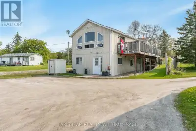 Top 5 Reasons You Will Love This Home: 1) Prime waterfront location on Orr Lake with a 1,673 square...