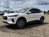 Welcome to Freedom Ford. **WE WILL BEAT ANY FORD DEALER IN THE CITY** The 2025 Ford Escape Plug-In H... (image 1)