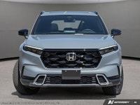Step into the future with the 2026 Honda CR-V Hybrid Touring in a stunning gray finish and all-wheel... (image 1)