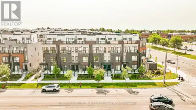 "LOVE WHERE YOU LIVE" Welcome to this stunning 2024-built, Ground level condo townhouse in the famil...
