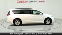 The 2022 Chrysler Pacifica Touring L is a family-friendly minivan that offers a comfortable ride, a... (image 1)