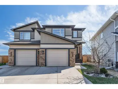 Welcome to this beautiful half duplex in Cavanagh basks on green space, former Pacesetter show home...