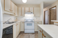Welcome to Huntington Court Coachhomes, where comfort and convenience come together in a welcoming c... (image 4)