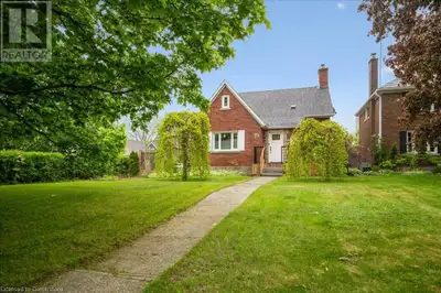 Corner-Lot Charmer in Uptown Waterloo! Walk to LRT, Vincenzo’s, Parks & Top Schools. Discover the be...