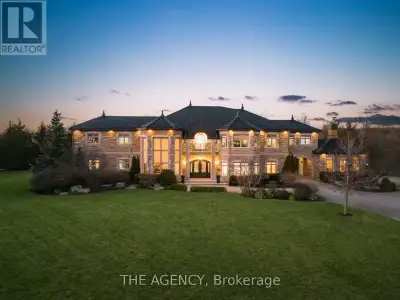 Experience a Rare Level of Refinement in This Extraordinary North Burlington Estate, Privately Set W...